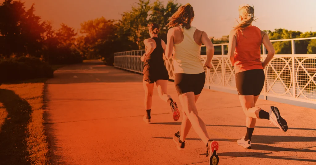 a group of runners running together